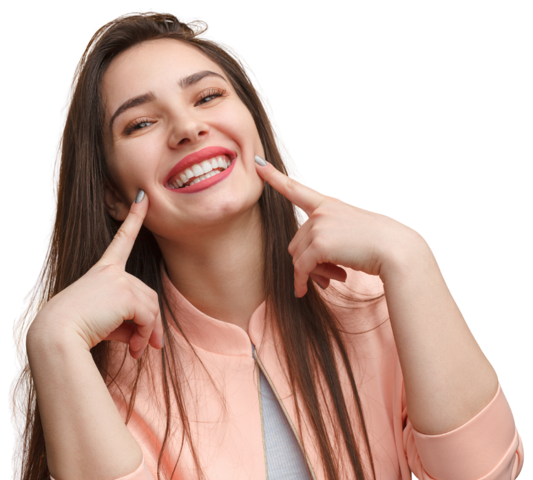 A happy young woman pointing at her smile